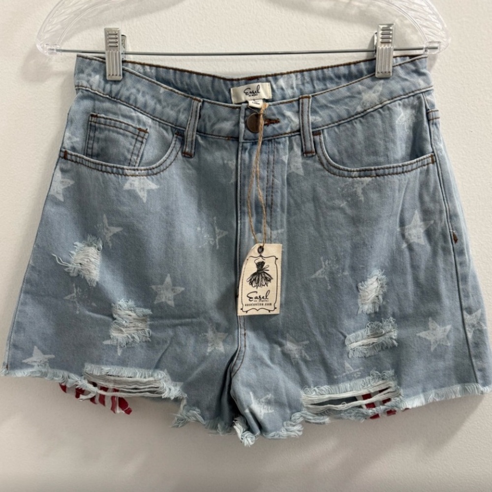 #360 Easel 100% 30” waist Cotton, stars printed fringe bottom distressed denim.